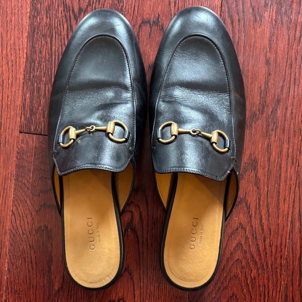 Gucci Black Leather womenss Slip-On Loafers with Gold Accents